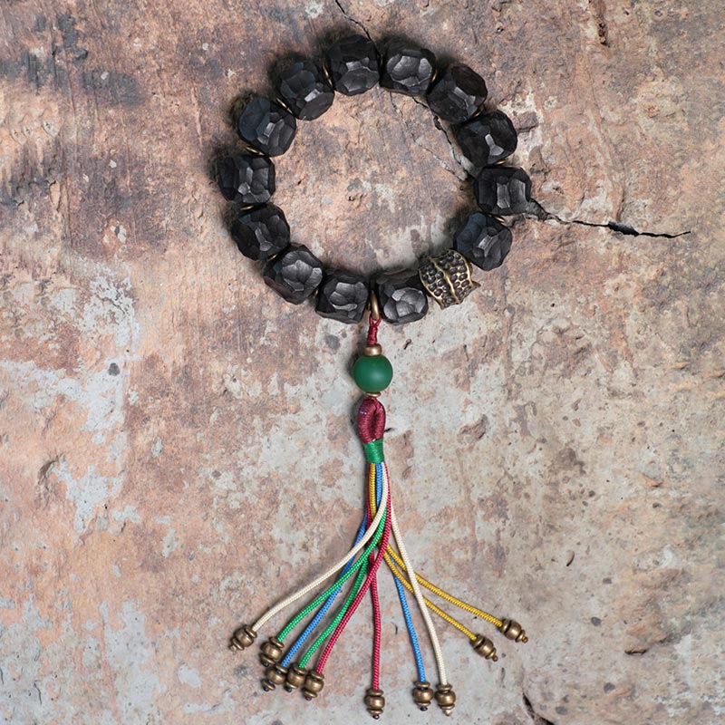 Stone of buddha Tibet Ebony Wood Copper Peace Tassel Wrist Mala Bracelet