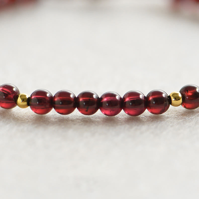 Stone of buddha Natural Garnet Golden Beads Stability Bracelet