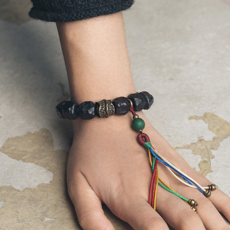 Stone of buddha Tibet Ebony Wood Copper Peace Tassel Wrist Mala Bracelet
