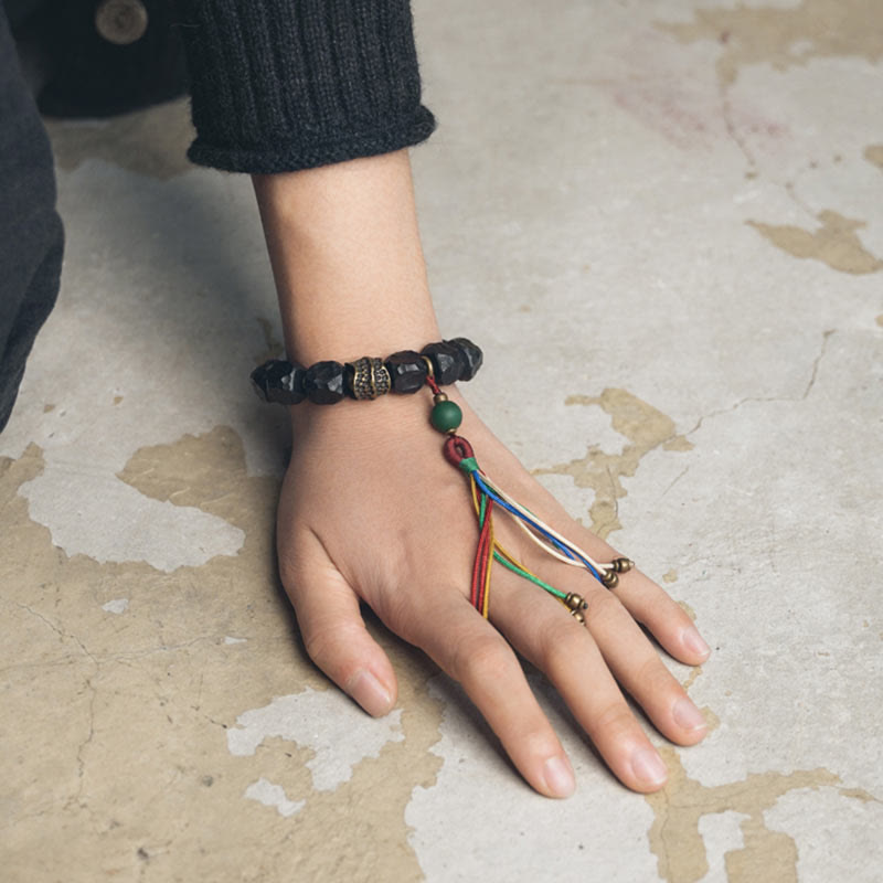 Stone of buddha Tibet Ebony Wood Copper Peace Tassel Wrist Mala Bracelet